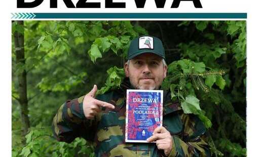 Plakat promujący spotkanie z Pawłem Średzińskim. 